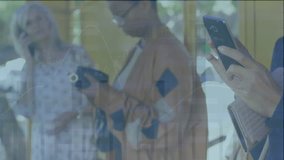 Animation of multiple graphs, man typing on smartphone while waiting for bus at bus stop. Digital composite, multiple exposure, report, business, transportation and technology concept. - Powered by Shutterstock - Get 15% off with code: PIKWIZARD15