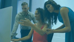 Animation of multicolored infographic interface, diverse coworkers discussing reports on computer. Digital composite, multiple exposure, business, coding, teamwork and technology concept. - Powered by Shutterstock - Get 15% off with code: PIKWIZARD15