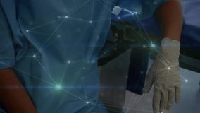 Animation of network of connections over female surgeon with face mask. global medicine and digital interface concept digitally generated video. - Powered by Shutterstock - Get 15% off with code: PIKWIZARD15