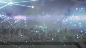 Animation of network of connections over cityscape. Global connections digital interface data processing concept digitally generated video. - Powered by Shutterstock - Get 15% off with code: PIKWIZARD15