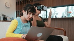 Granddaughter control laptop guide grandmother to dive in metaverse with VR. Senior adapt to technology activity communicate new generation kid cross generation gap strengthen family bond. Divergence. - Powered by Shutterstock - Get 15% off with code: PIKWIZARD15
