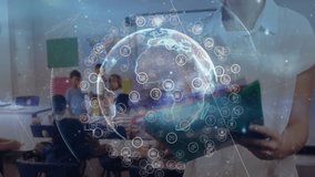 Female teacher tapping tablet, showing rotating 3D globe with icons in classroom, engaging students. Interactive, innovation, digital, education, technology, collaboration, modern - Powered by Shutterstock - Get 15% off with code: PIKWIZARD15