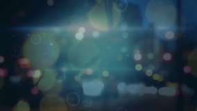 This is a 4k digital animation of road traffic in a city at night with blurred city lights and yellow spots of light in the foreground. Global connections data processing digital interface and - Powered by Shutterstock - Get 15% off with code: PIKWIZARD15