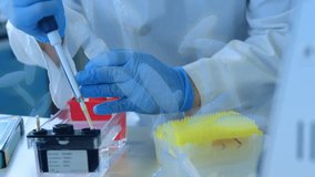 Animation of dna and chemical structures over mid section of a male scientist working at laboratory. Medical research and science technology concept - Powered by Shutterstock - Get 15% off with code: PIKWIZARD15