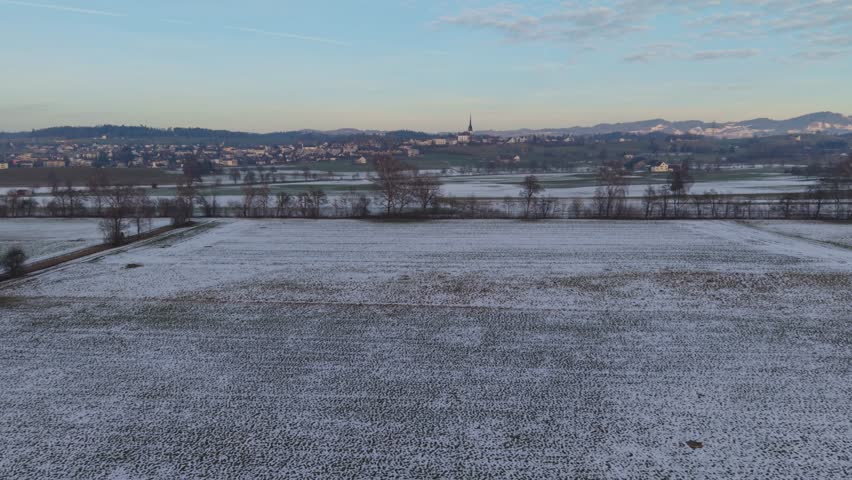 Switzerland countryside winter day and snow on the filed