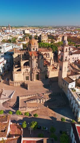 Aerial view of Jerez de la Frontera town in Andalusia, Spain. Jerez Cathedral and historic Moorish Alcazar de Jerez de la Frontera at sunset in Andalucia