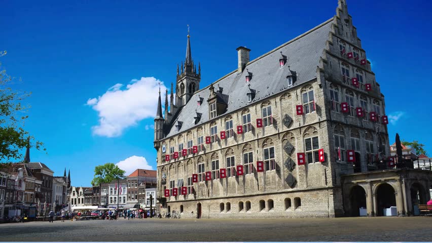 Gouda, Netherlands Medieval Historical Town Hall on Market SquareThe historic town hall of Gouda NetherlandsThe historic town hall of Gouda Netherlandsthe netherlands, destination,  ornamental, sight, antique, ornate, center, stadhuis van  city council,   facade, attraction, medieval, tradition, street, sightseeing, historical, market, old, architecture, tourist, city, tower, europe, travel, history, tourism, courtyard, square, ancient, netherlands, holland, historic, gothic, stonework,  city  residence, landmark, cityscape, building, house, monument, town hall meeting, market - retail space,  - south holland, outdoors
