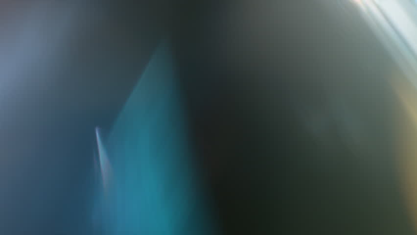 Real Shooted Cinematic Lens Flare Overlay on Black Background at 1000fps Slow Motion.