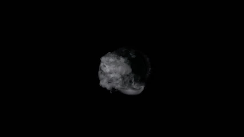 Super Slow Motion Shot of Real Smoke Spreading Towards Camera Isolated on Black at 1000fps.