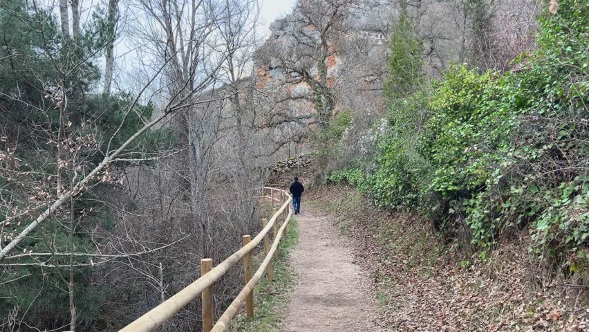 Man walking along the trail to Pozo Azul