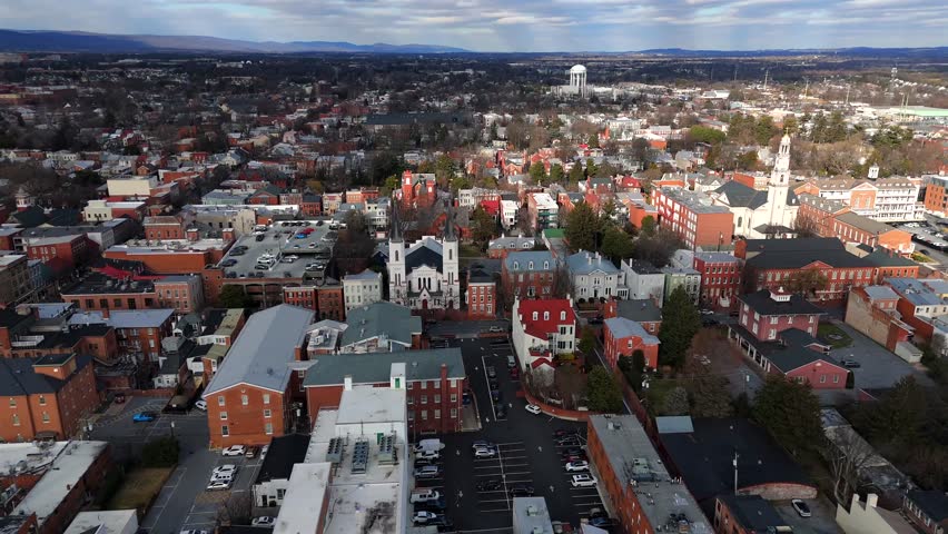 Drone view of classic American town with church steeple in Frederick Maryland