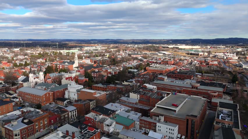 Close aerial view of twin spired church in Frederick Maryland