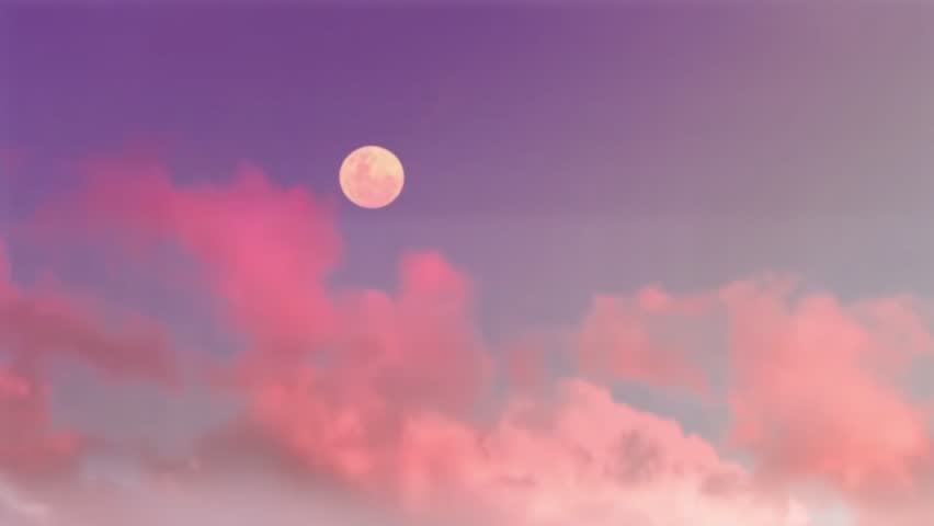 Beautiful Full Moon Rising in a Purple Pastel Sky with Pink Clouds