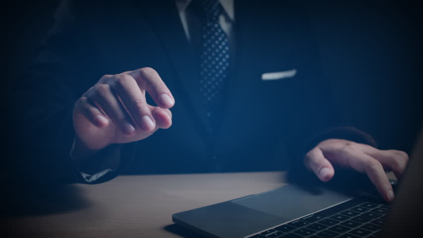 Hands typing on laptop with virtual document approval interface, representing secure digital workflow and paperless business automation system, and verified digital documents concepts.