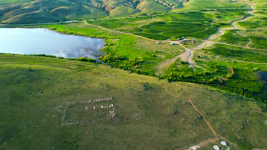 Lakes and Grasslands Under Blue Sky 4K Aerial Footage