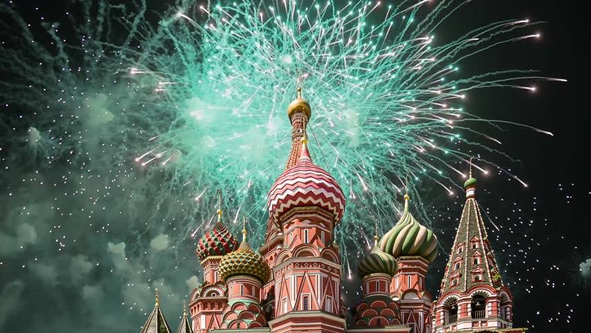 Temple of Basil the Blessed and fireworks in honor of Victory Day celebration (WWII), Red Square, Moscow, Russia. Time lapse 
