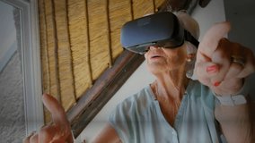 Animation of shape with numbers over senior caucasian woman using vr headset. global business and digital interface concept digitally generated video. - Powered by Shutterstock - Get 15% off with code: PIKWIZARD15