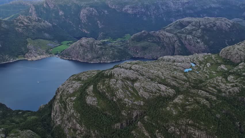 From above, this breathtaking landscape captures Norway’s fjords and rugged terrain.