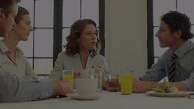 Animation of data processing over diverse businesspeople discussing while having lunch at office. Computer interface and business data technology concept - Powered by Shutterstock - Get 15% off with code: PIKWIZARD15