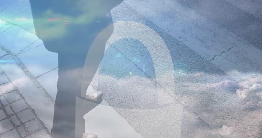 Animation of network of connections over clouds and midsection of africanamerican businessman. Business, network, connections and communications concept digitally generated video.