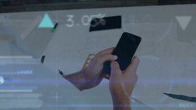 Animation of data processing over rear view of businessman using smartphone at office. Business data technology concept - Powered by Shutterstock - Get 15% off with code: PIKWIZARD15