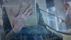 Animation of data processing over caucasian businesswoman using tablet. Global business and digital interface concept digitally generated video. - Powered by Shutterstock - Get 15% off with code: PIKWIZARD15