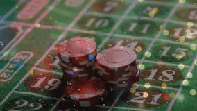 Animation of spots of light and colorful confetti over stack of casino poker chips on a table. Casino and gambling concept - Powered by Shutterstock - Get 15% off with code: PIKWIZARD15