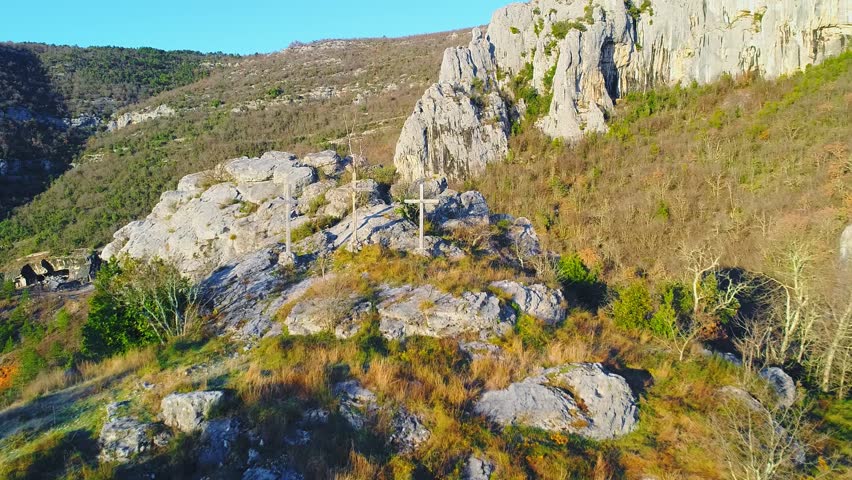 Aerial panoramic view of a rocky karst hilltop in Istria, Croatia in 2019, with exposed stone, low vegetation and dramatic natural terrain.