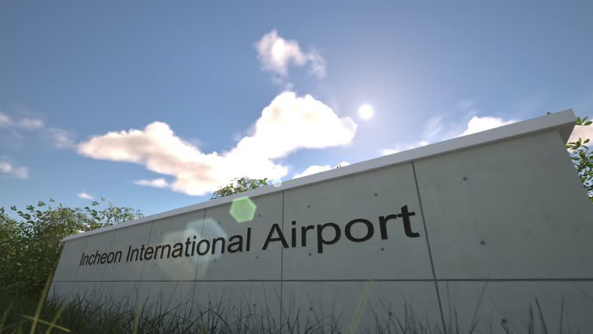 Departures at Incheon International Airport with airplane leaving overhead, Seoul, South Korea