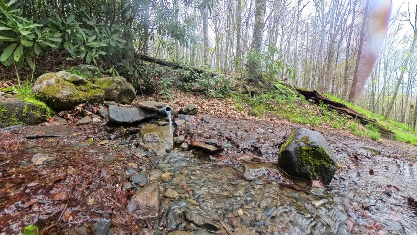 Source of Eagle Creek Pours Out of Piped Spring in the Appalachian Mountains