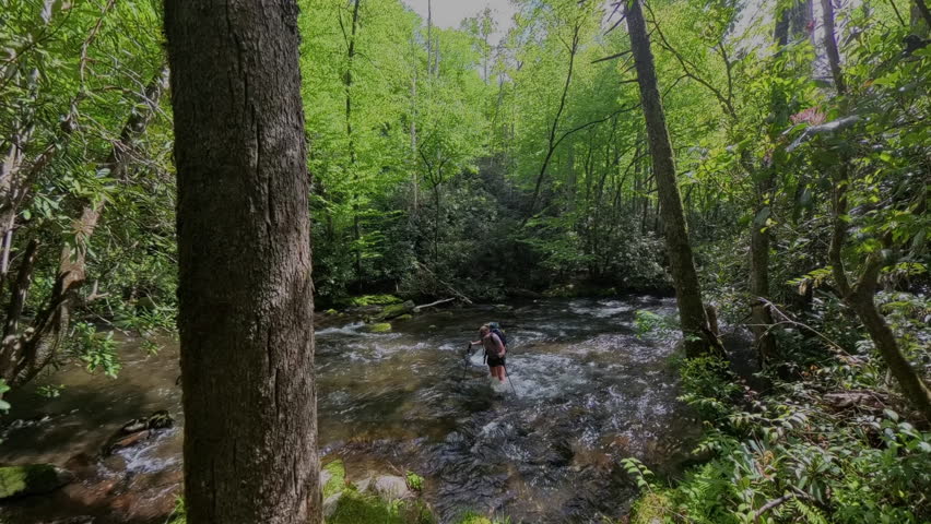 Woman Exits Large Creek Crossing in Great Smoky Mountains National Park