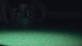 Poker chips stacked on a game table, capturing casino gameplay, gambling, card games, and the excitement of a poker session. - Powered by Shutterstock - Get 15% off with code: PIKWIZARD15