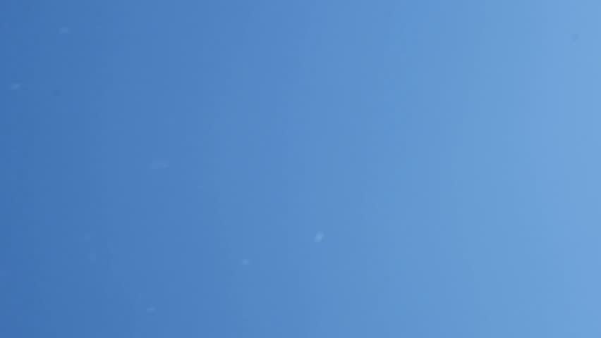 water spray, breeze on blue sky background 