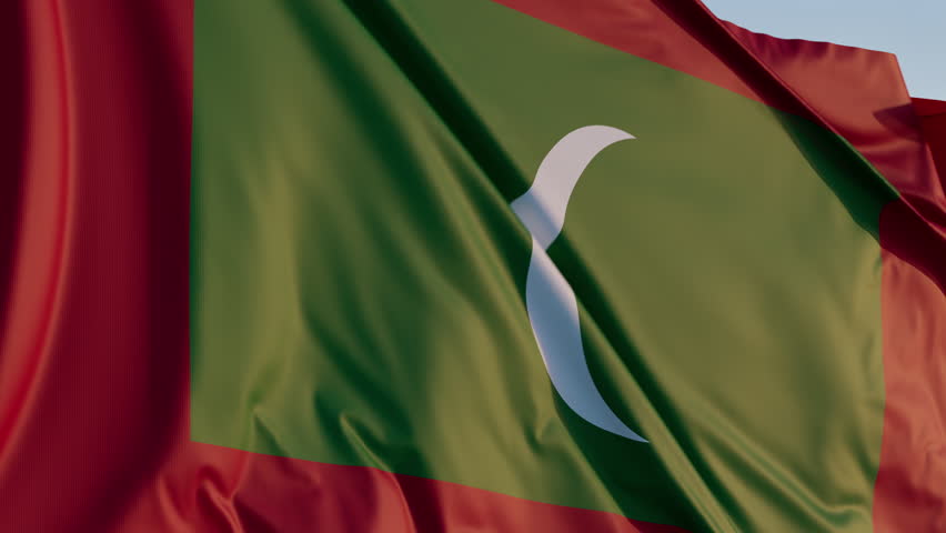 Maldives, Male: Cinematic Waving National Flag Against Blue Sky