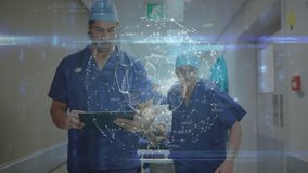 Animation of digital data interface over two diverse doctors. global medicine, technology, data processing and digital interface concept digitally generated video. - Powered by Shutterstock - Get 15% off with code: PIKWIZARD15
