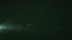 Animations of glowing lights over dark background. Lights, energy, movement and background concept digitally generated video. - Powered by Shutterstock - Get 15% off with code: PIKWIZARD15