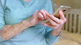 Animation of gamepad icon over senior caucasian woman using smartphone. Global technology, computing and digital interface concept digitally generated video. - Powered by Shutterstock - Get 15% off with code: PIKWIZARD15
