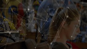 Woman lifting touchscreen on red seat in bicycle shop, browsing catalog with network overlay. Futuristic, technology, innovation, connectivity, urban, stylish, digital - Powered by Shutterstock - Get 15% off with code: PIKWIZARD15