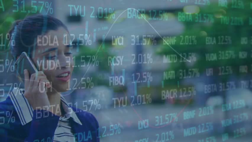 A businesswoman is talking on her mobile phone while standing on the street. She is surrounded by a global digital interface with financial data and connections.