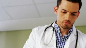 Animation of caucasian male doctor with documents over data processing. global medicine and digital interface concept digitally generated video. - Powered by Shutterstock - Get 15% off with code: PIKWIZARD15