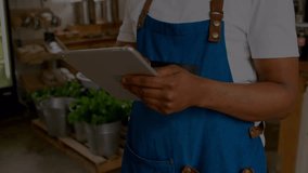 Animation of data processing over businessman using tablet. Global business data processing and digital interface during covid pandemic concept digitally generated video. - Powered by Shutterstock - Get 15% off with code: PIKWIZARD15