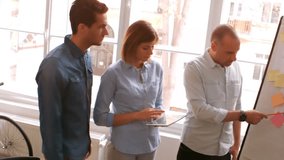 Animation of scope scanning over business people using electronic devices. Global connections business digital interface technology and networking concept digitally generated video. - Powered by Shutterstock - Get 15% off with code: PIKWIZARD15