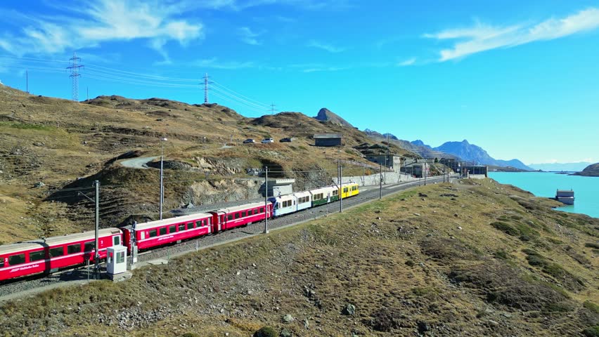 Aerial view of train near lake, Switzerland.