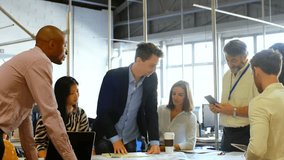 Application icons connecting with lines over multiracial coworkers discussing blueprints in meeting. Animation, digital composite, office, architecture, teamwork and technology concept, - Powered by Shutterstock - Get 15% off with code: PIKWIZARD15