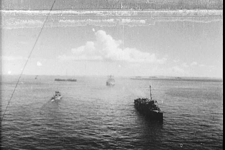 1940s - Warships attack Anguar Island during World War Two.