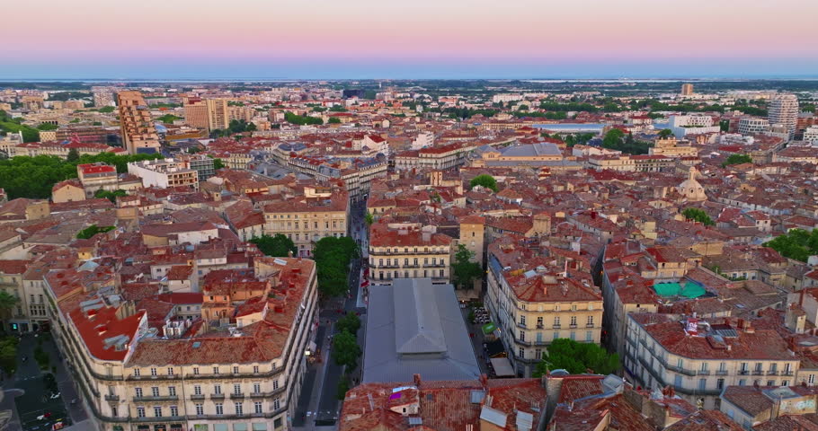 Aerial view of Montpellier, France. Aerial establishing shot of downtown Montpellier with a crowd of people