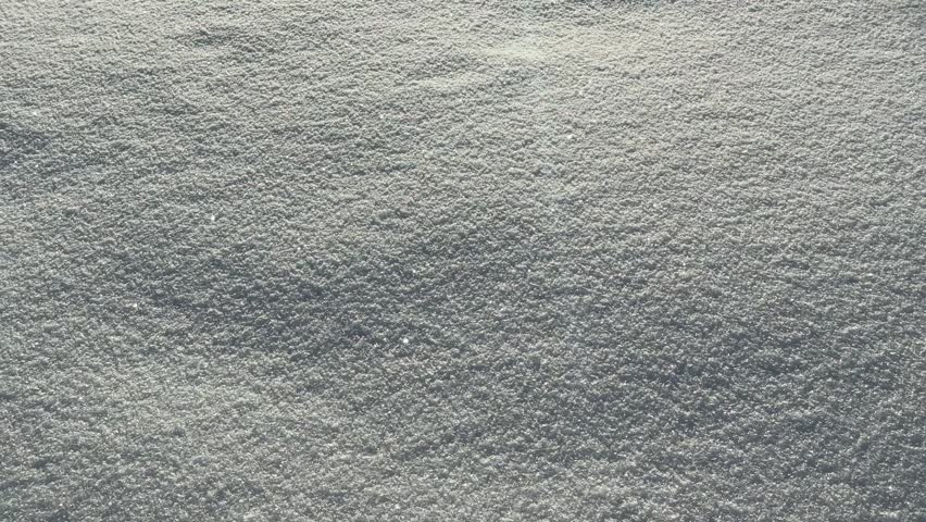 Close-up of the smooth texture of snow