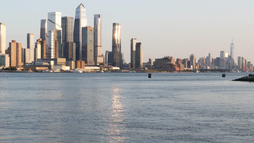 New York City Manhattan Midtown skyline, Downtown and Hudson Yards from New Jersey, Weehawken Port Imperial, United States. Urban cityscape with skyscraper building, American architecture. River.