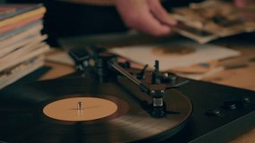 Retro Vinyl record player playing music, close-up macro shot of vintage LP disc old phonograph spinning. Retro music player at home. - Powered by Shutterstock - Get 15% off with code: PIKWIZARD15