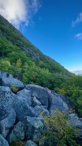 Difficult Rock Scramble Across Boulders on the Side of a Mountain on Precipice Trail (Acadia National Park, Maine, USA)